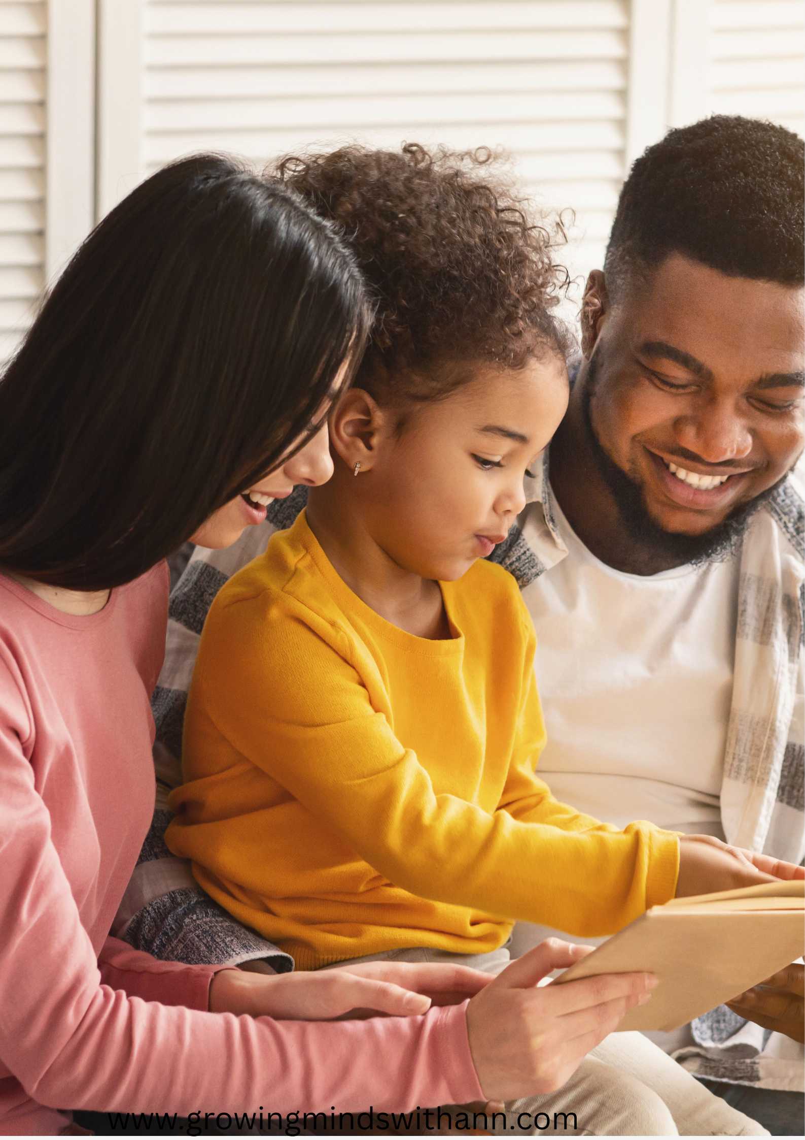 mum-in-pink-with-dad-in-white-reading-with-their-child-in-preschool-reading-tips-for-parents