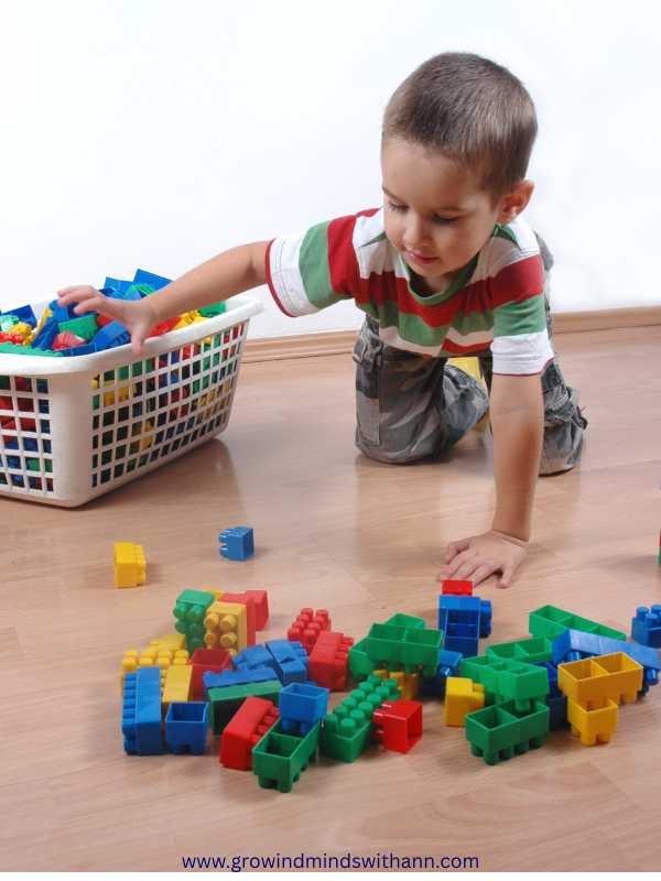 A-child-arranging-toys-of-different-colours-in-a-basket