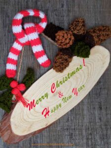 Pinecone-and-Yarn-Ornament-made-of-pink-white-and-brown-ornament-in-10-easy-diy-christmas-ornament-for-kids