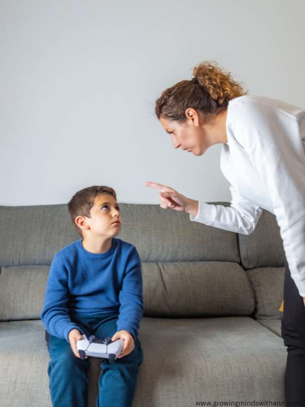 a-mother-in-white-top-shouting-at-her-son-in-blue-top-in-10-common-mistakes-parents-should-avoid-in-their-child's-early-years