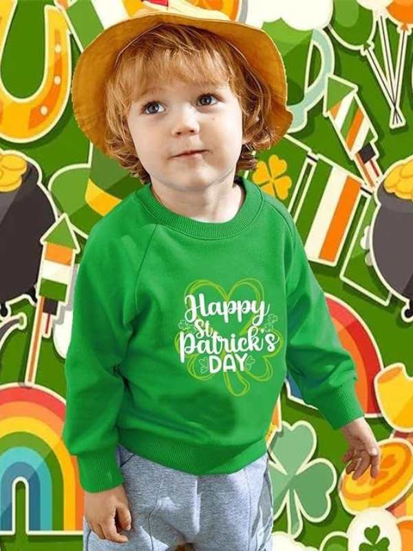 Boy-wearing-green-sweatshirt-written-happy-Patrick's-day-in-lovely-St-Patrick's-kids-outfit-ideas.