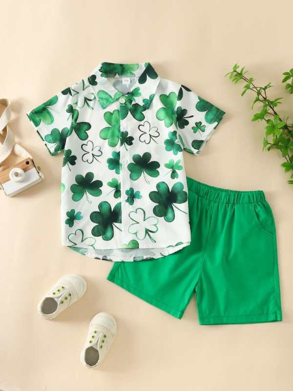 A-shirt-wit-green-printed-shamrock-green-shorts-and-white-sneakers.
