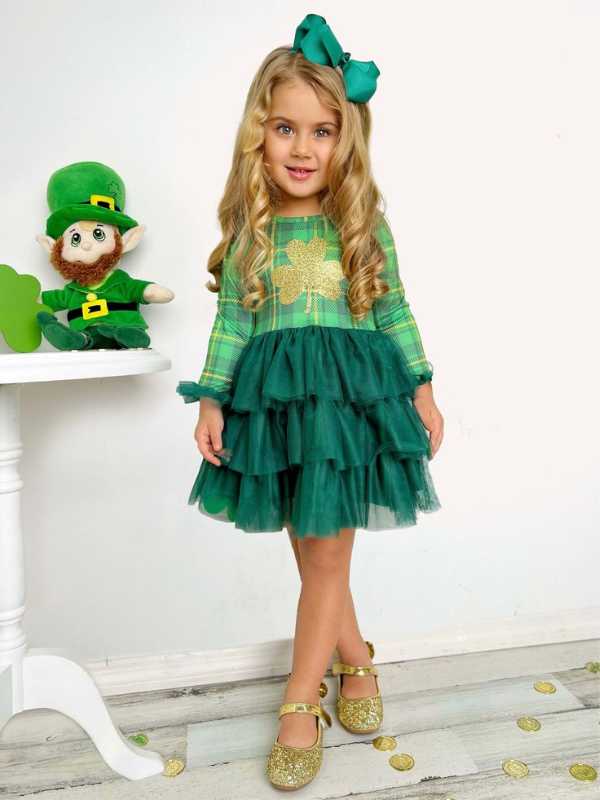 Girl-wearing-shimmering-shamrock-tiered-tutu-dress.