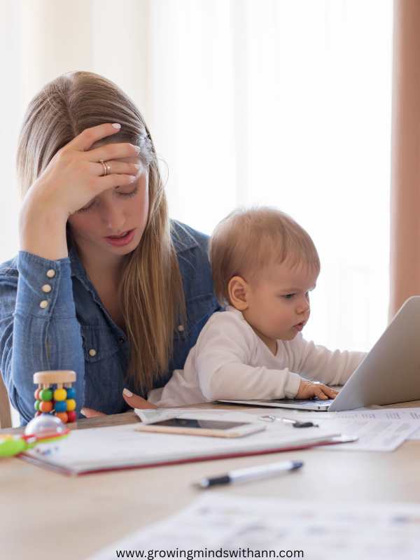 Mom-in-blue-holding-her-forehead-with-her-daughter-pressing-her-computer.