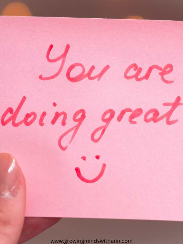 Affirmation-written-on-a-pink-paper-with-a-red-pen-in-how-to-slow-down-and-be-mindful-as-a-busy-mom.