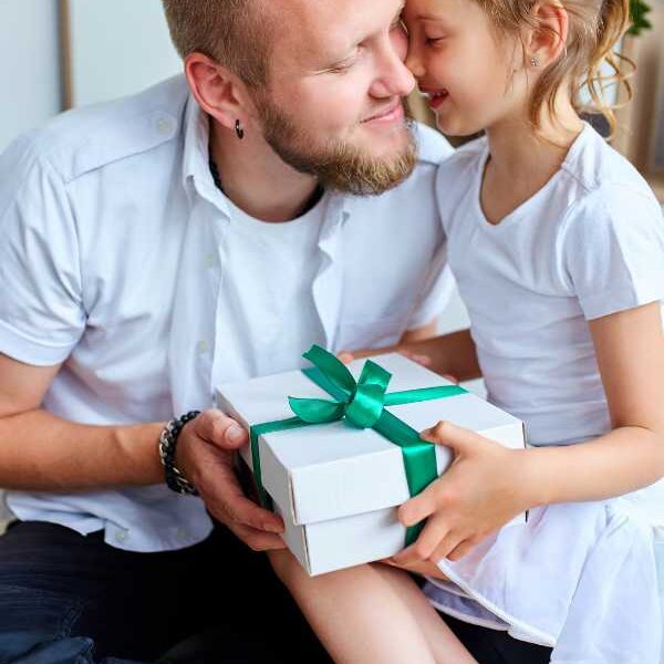 father-receiving-gift-from-his-daughter-in-adorable-father's-day-gift-ideas-for-kids.