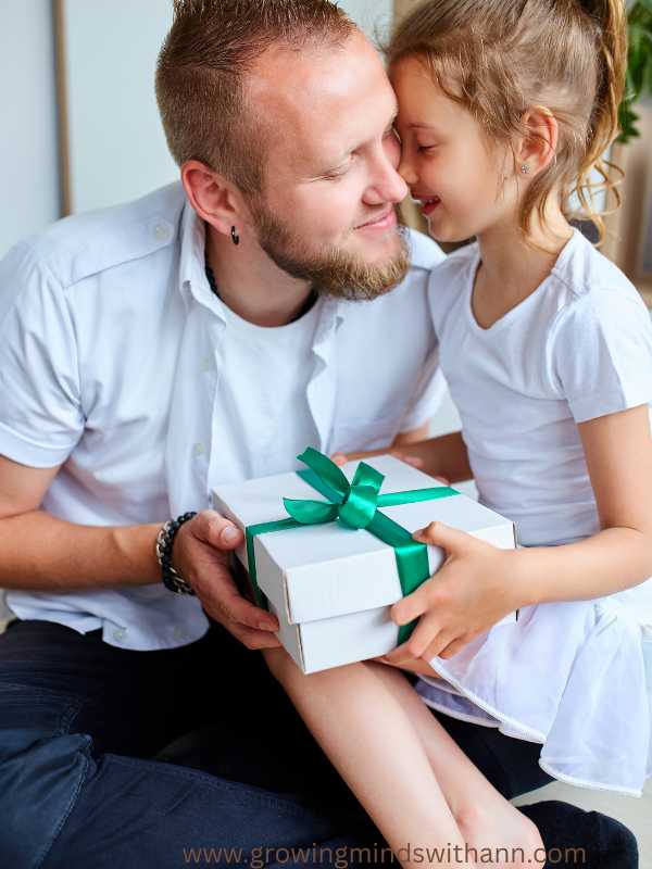 father-receiving-gift-from-his-daughter-in-adorable-father's-day-gift-ideas-for-kids.