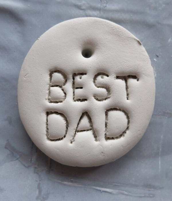 Clay-carving-inscribed-best-dad.
