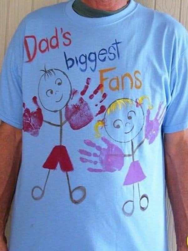 A-man-wearing-a-blue-stamped-T-shirt-without-showing-face-in-adorable-father's-day-gift-ideas-from-kids.