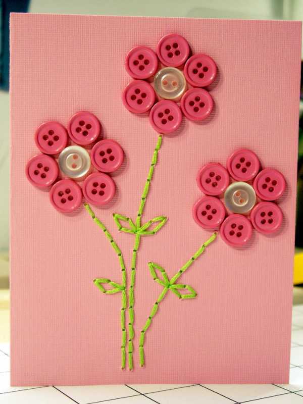 Button-flower-made-of-pink-and-white-buttons-in-lovely-mother's-day-flower-craft-for-kids.
