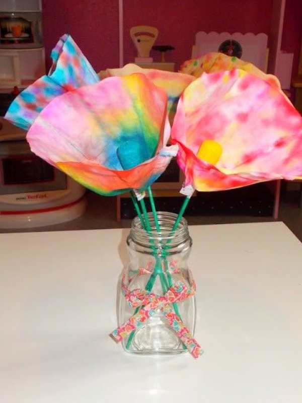 Coffee-filter--flower-with-different-colors-inside-a-bottle.