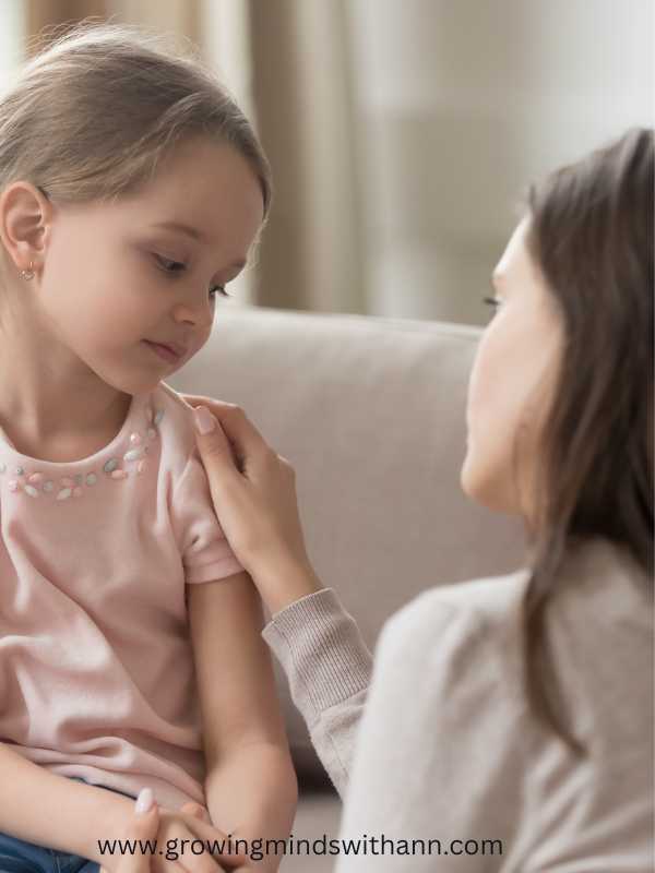 Mom-in-white-discussing-with-her-daughter-in-pink.