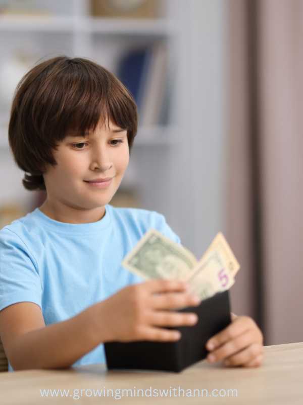 Boy-in-blue-bringing-out-money-from-wallet-in-what-to-do-when-your-child's-steals-money-calm-step-by-step-guide-for-moms.