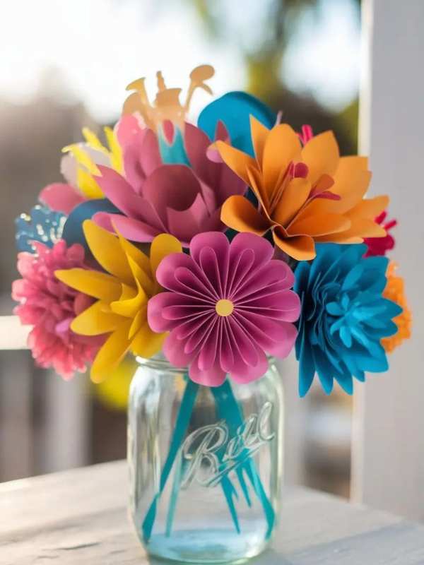 Flower-bouquet-made-from-different-colors-of-paper-inside-a-glass-jar-in-creative-mother's-day-gift-ideas-you-can-make-and-sell.