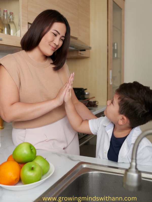 Mom-having-a-high-handshake-with-the-son.