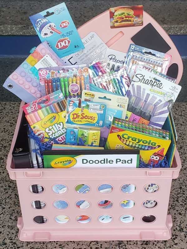 Basket-filled-with-itemizes-needed-in-the-class-such-as-ruler-pen-pencil-book-marker-etc-in-cute-teacher's-appreciation-basket-ideas.
