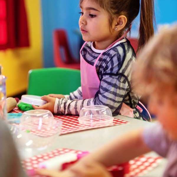 Kids-watching-and-crafting-in-fun-and-creative-spring-crafts-for-preschoolers.