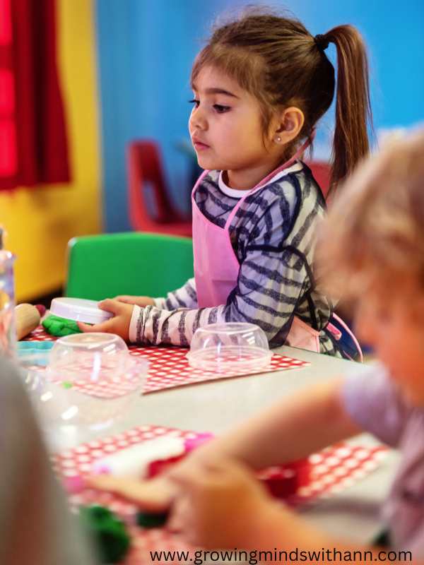 Kids-watching-and-crafting-in-fun-and-creative-spring-crafts-for-preschoolers.