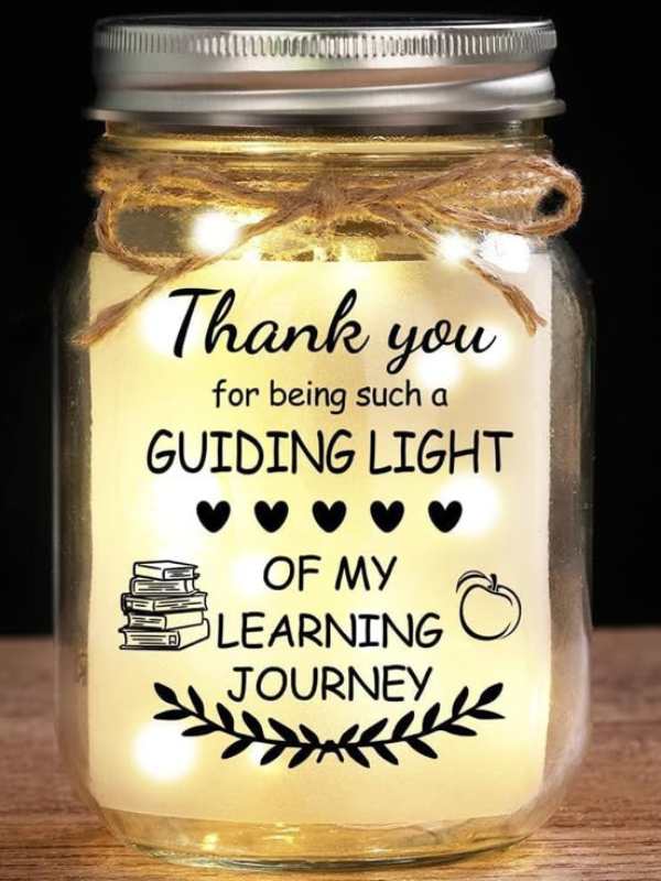 Memory-jar-with-paper-on-it-written-thank-you-for-being-such-a-guiding-light-of-my-learning-journey.