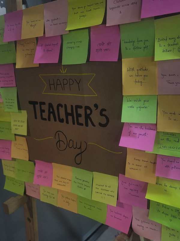 Board-with-different colors-of-paper-written-appreciation-notes-for-teacher-and-happy-teacher's-day-boldly-written-in-the-center-in-fun-classroom-activities-to-celebrate-teacher's-day.