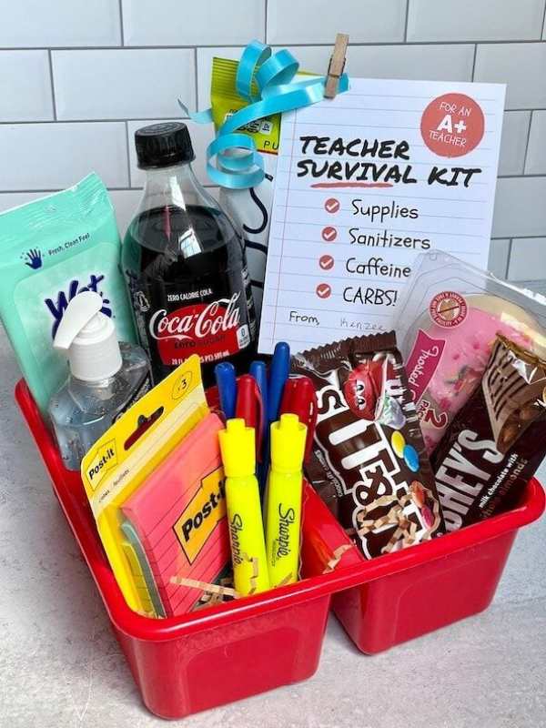 Basket-filled-with-soft-drink-biscuit-pen-and-other-essential-items-the-teacher-will-need-for-the-day.