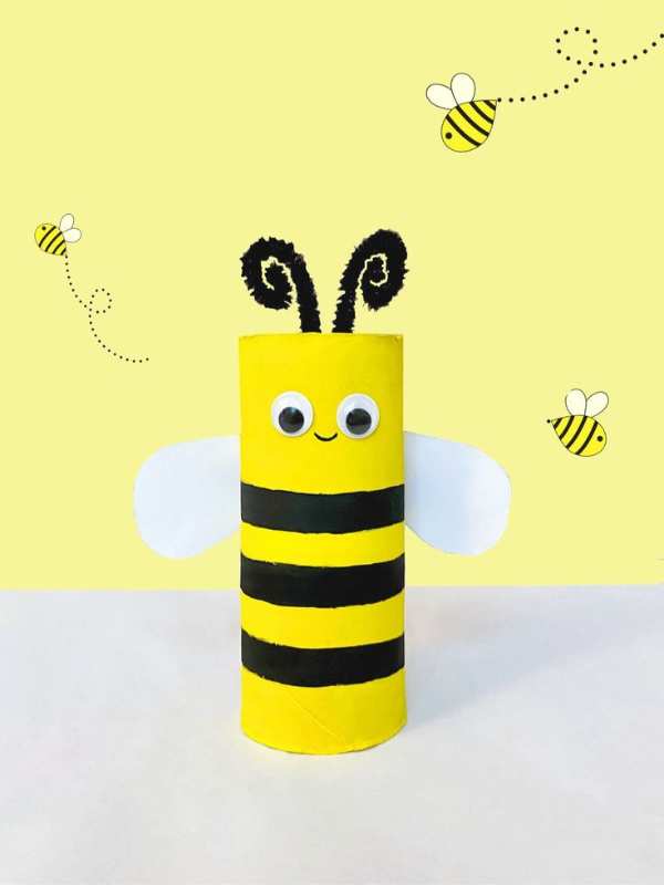 Bee-designed-with-toilet-roll-black-and-white-paper-and-yellow-paint-in-fun-and-creative-spring-crafts-for-preschoolers.