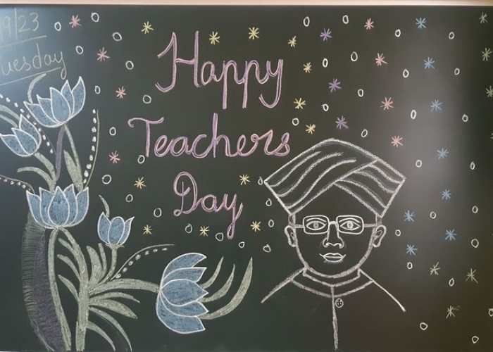 A-flower-and-human-art-design-on-a-black-board-with-written-text-in-creative-teacher's-day-decoration-ideas-for-classrooms.