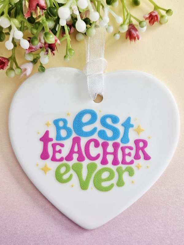 White-ceramic-heart-ornament-written-beat-teacher-ever-in-surprise-teacher's-day-gift-ideas-they-will-never-forget.