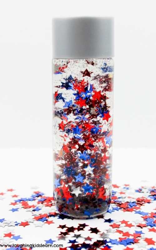 A-clear-bottle-containing-water-red-blue-and-white-glitters.