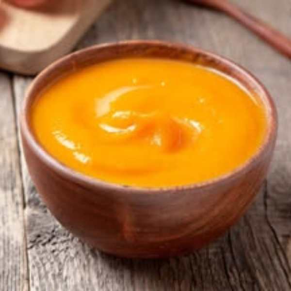 Brown-plate-containing-containing-sweet-potato-puree-in-healthy-homemade-babay-puree-recipes-you-can-freeze.