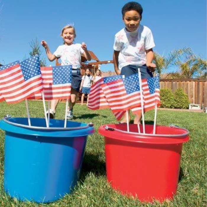 Flags-in-red-and-blue-bowels-with-2-kids-running-towards-them.