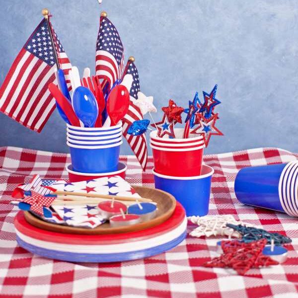 red-and-blue-cups-plates-with-american-flag-hangedon-the-wall-in-fun-4th-of-july-games-your-family-will-love.