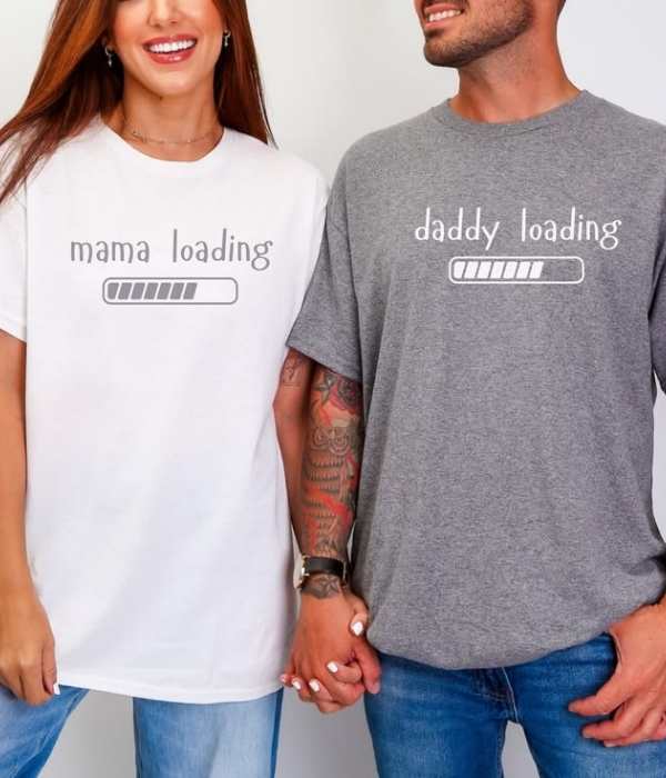 Wife-wearing-white-T-shirt-written-mama-loading-and-husband-wearing-T-shirt-written-daddy-loading.