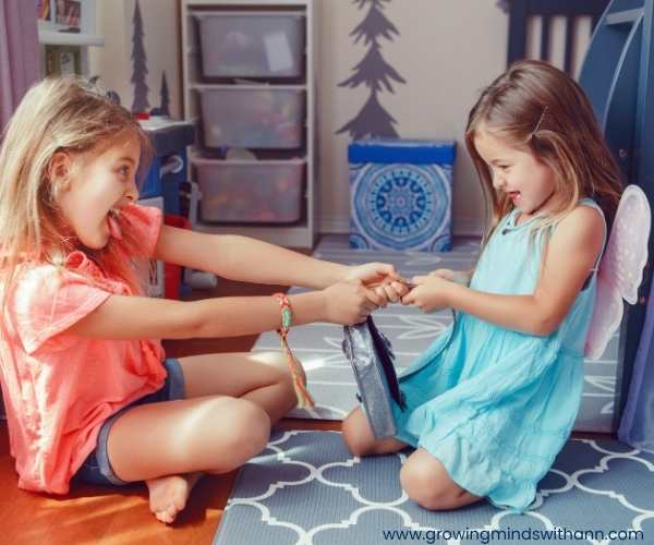 2-kids-fighting-over-toys.