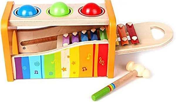 Pound-tape-bench-with-slide-out-xylophone-made-with-many-bright-colors.