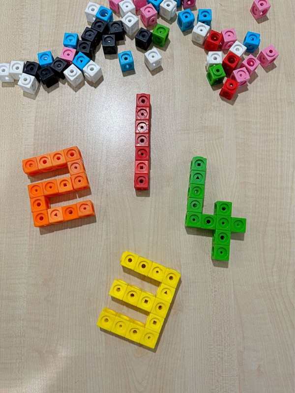 Multi-link-cubes-used-to-create-one-two-three-and-four.