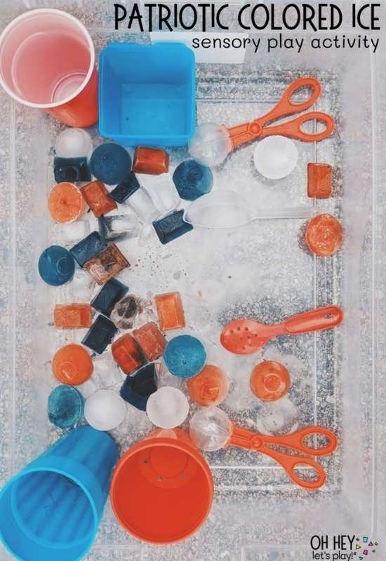 Bin-containing-ice-colored-red-white-blue-with-cups-and-scoops-in-4th-of-July-sensory-bin-easy-patriotic-sensory-play-for-kids.