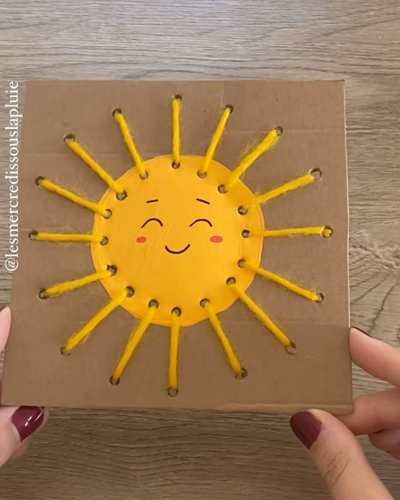Sunshine-paper-weaving-craft-woven-into-cartoon-with-yellow-yarn-in-cute-sun-crafts-for-preschoolers.