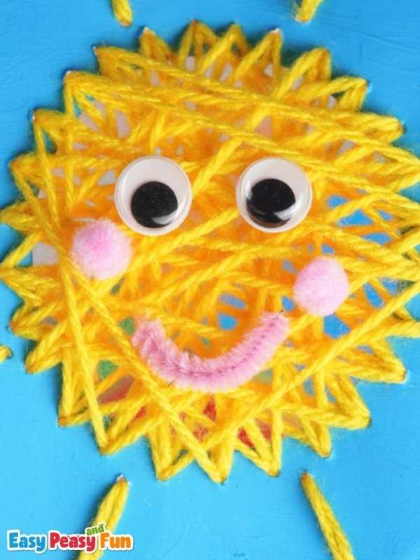 Yarn-wrapped-sun-on-a-blue-background.