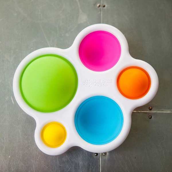 Fat-brain-toys-in-white-pink-green-blue-and-yellow-colors.