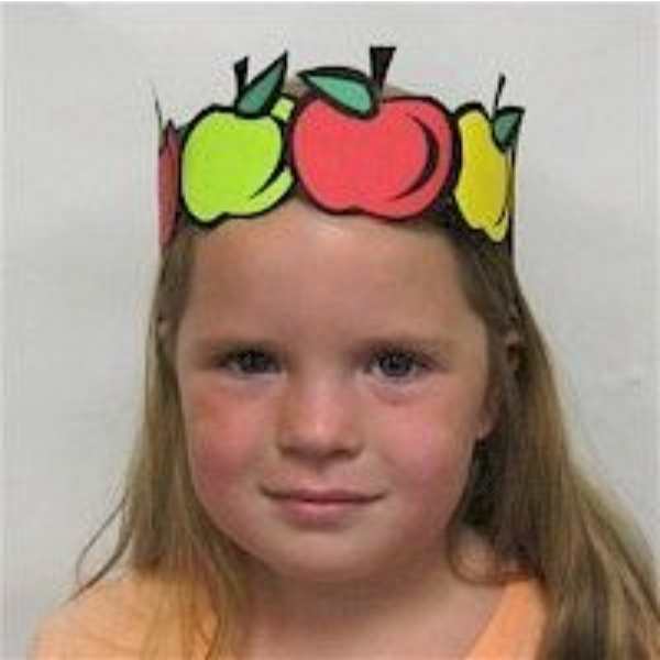 Girl-wearing-apple-craft-in-apple-crafts-for-kids.