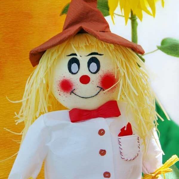Scarecrow-dressed-in-white-red--and-brown-color-in-harvest-craft-ideas-for-kids.