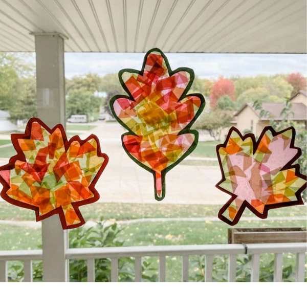 3-leaf-sun-catcher-cfrat-palced-on-glass-window.
