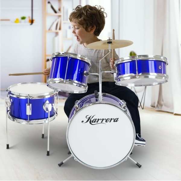 Child-beating-a-drum-set-in-non-toy-gift-ideas-for-elementary-kids.