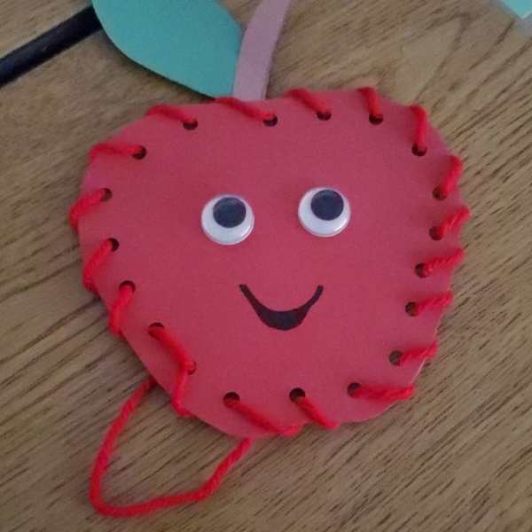 Red-sewed-apple-designed-with-google-eyes-in-apple-crafts-for-kids.