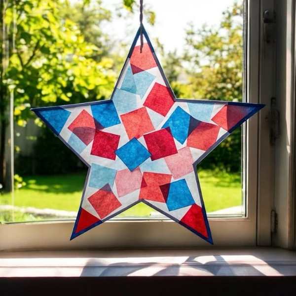 Star-sun-catcher-displayed-on-a-window.