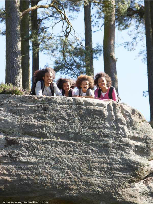 Family-on-a-high-rock-in-summer-bucket-list-ideas-for-families.