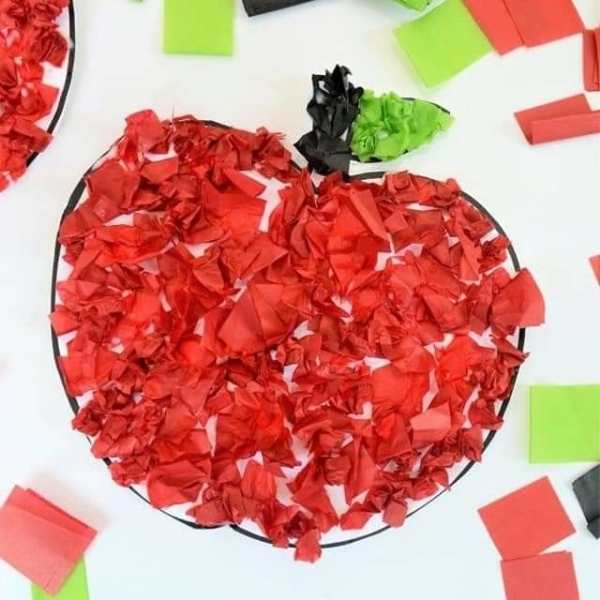 Red-tissue-paper-apple--with-green-tissue-paper-leave.