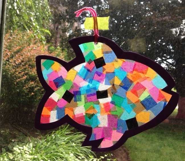 Fish-sun-catcher-crafts-displayed-on-a-window.