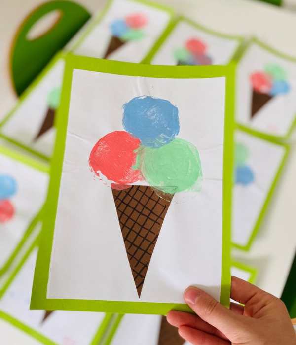 Hand-holding-potato-stamp-ice-cream-cone-in-ice-cream-ctaft-ideas-for-kids.